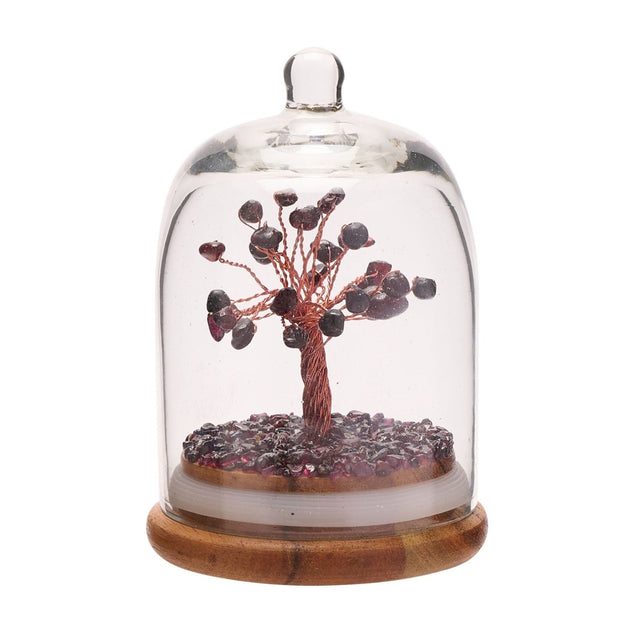 Garnet Gemstone Tree Dome Ornament featuring a copper-wire tree with purple garnet stones under a clear arched glass dome on a round wooden base, set against a white background.
