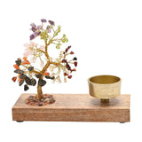 7 Chakras gemstone tree wooden tea light candle holder with brass cup on a rectangular brown wood base, set against a plain white background.