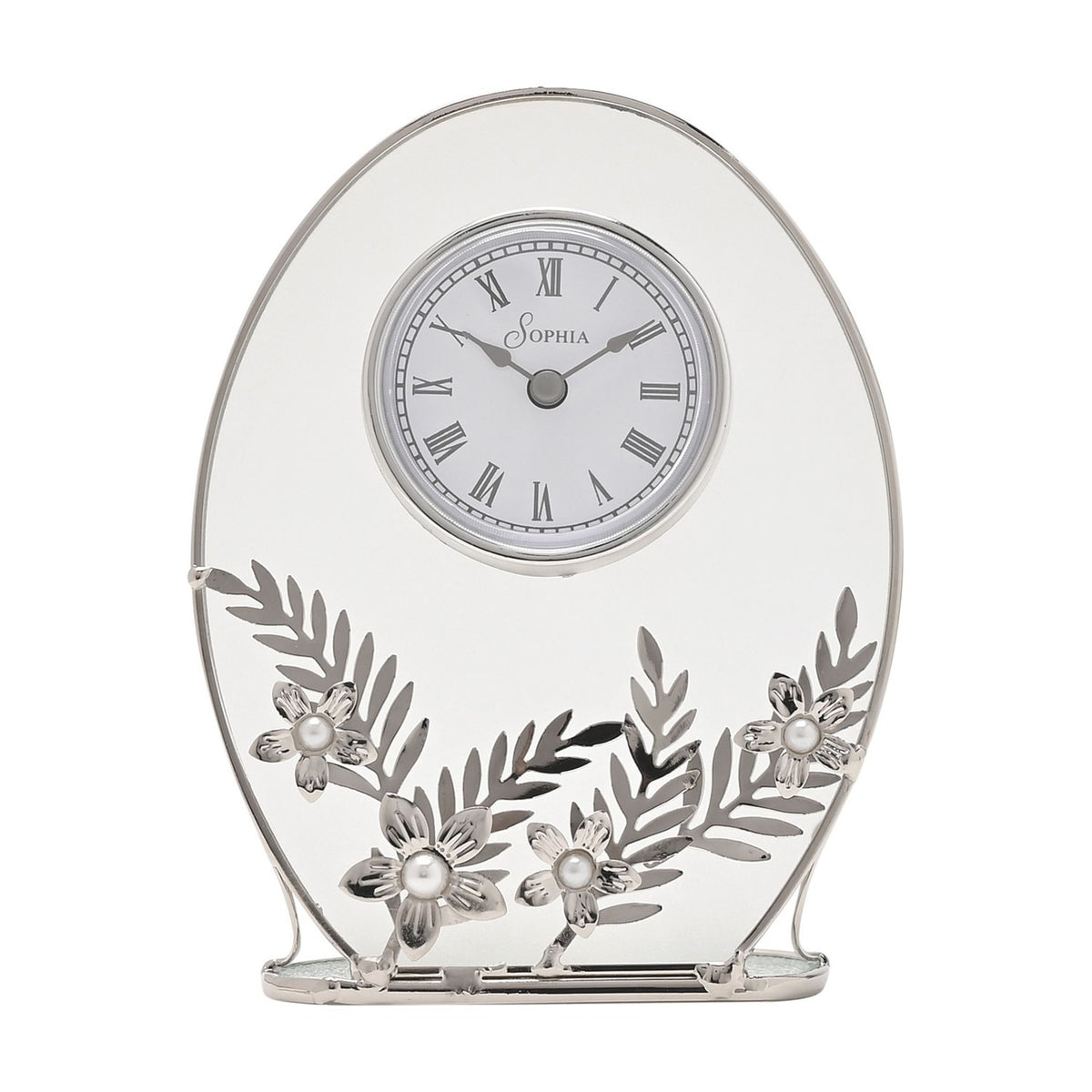 Oval mantel clock with clear glass panel and silver frame, white Roman numeral dial, and silver leaf and daisy details with pearl-effect centres, on a white background.