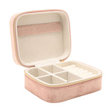 Classic Rectangular Velvet Jewellery Box in pink, open to show a cream interior with a ring strip, compartments, and a roll section, closed with a gold-tone zip, on a white background.