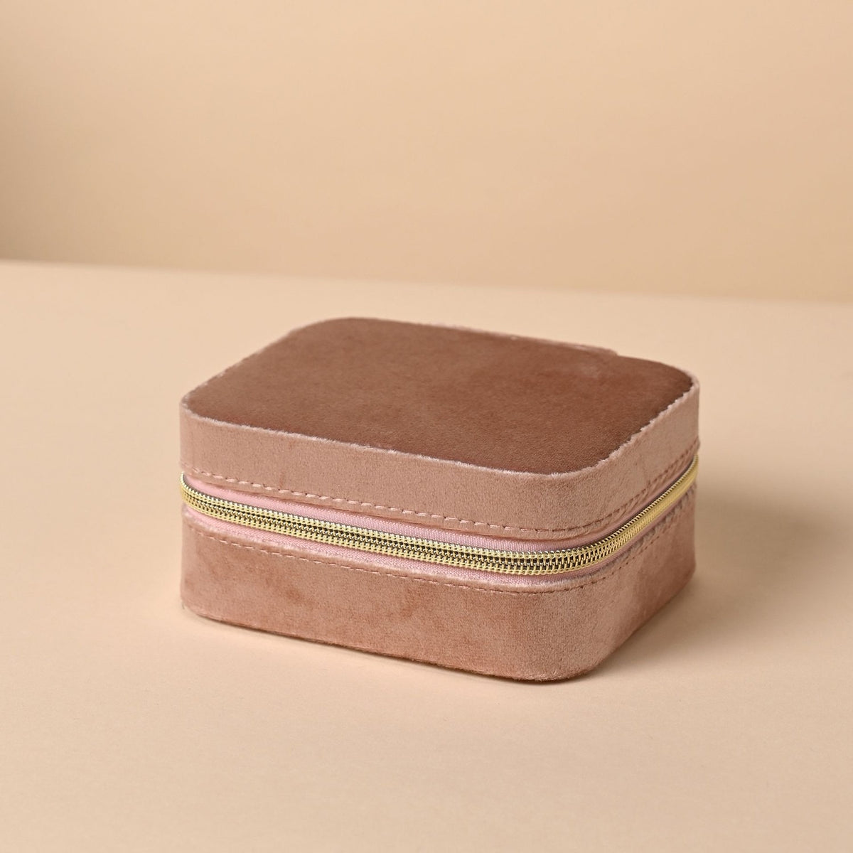 Classic Rectangular Velvet Jewellery Box in pink with gold-tone zip and round zip pull, set against a plain neutral background.