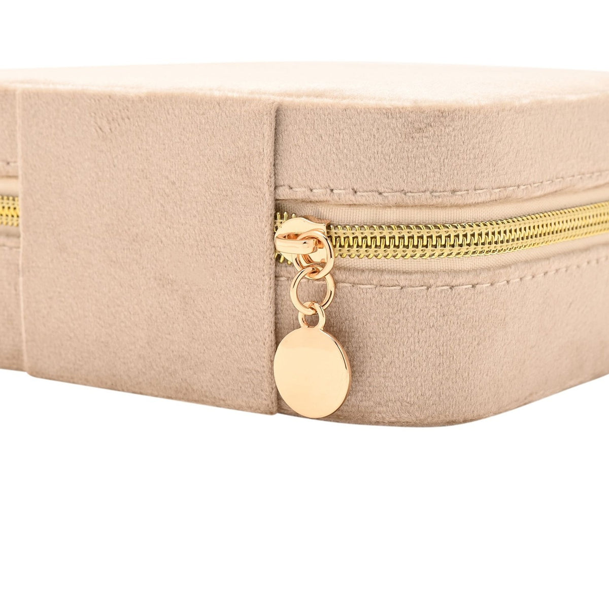 Close-up of a rectangular brown velvet jewellery box showing the gold-tone zip with round pull tab and top-stitched edge detail, on a plain white background.