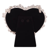 Back view of the Daisy Heart Freestanding Metal Photo Frame in white, showing black velvet backing with fold-out stand, holds a 4 x 3.5in photo.
