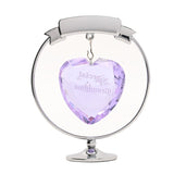 Chrome plated circle and heart decoration with a faceted lilac crystal heart engraved "Special Grandma" hanging beneath a banner, set on a round footed stand, shown on a white background.