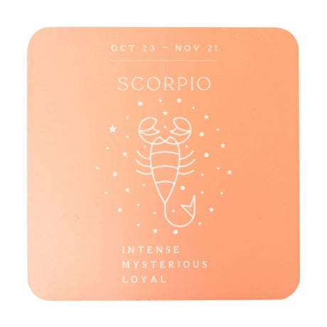 Square wooden Scorpio coaster in orange, with white line art of a scorpion, stars, dates Oct 23–Nov 21, and the words intense, mysterious, loyal.