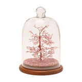 Gemstone Dome Tree figurine with copper-wire trunk and 200 pink gemstone beads, set on a matching pink chip base under a clear arched glass dome with wooden stand, on a white background.
