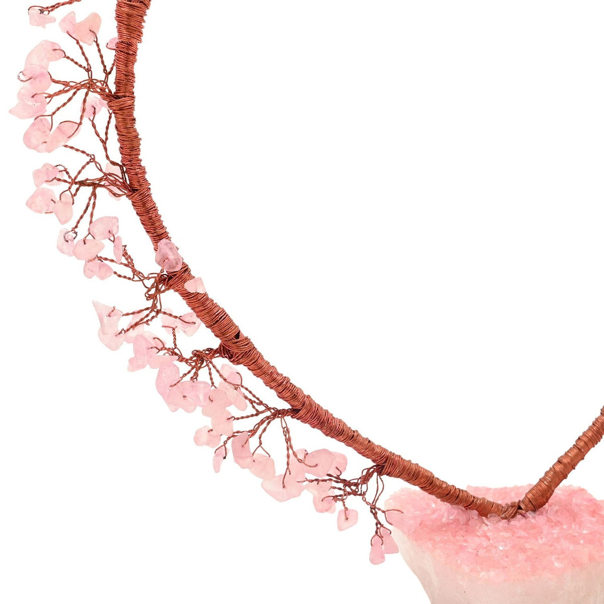 Close-up of the Rose Quartz Heart Tree Figurine, showing copper-toned wire branches with pale pink rose quartz chips and a raw crystal base, on a white background.