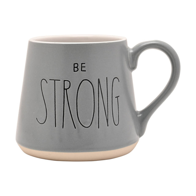 Grey tapered earthenware mug with "BE STRONG" in black lettering, white interior, and a pale unglazed band at the base, shown on a plain white background.