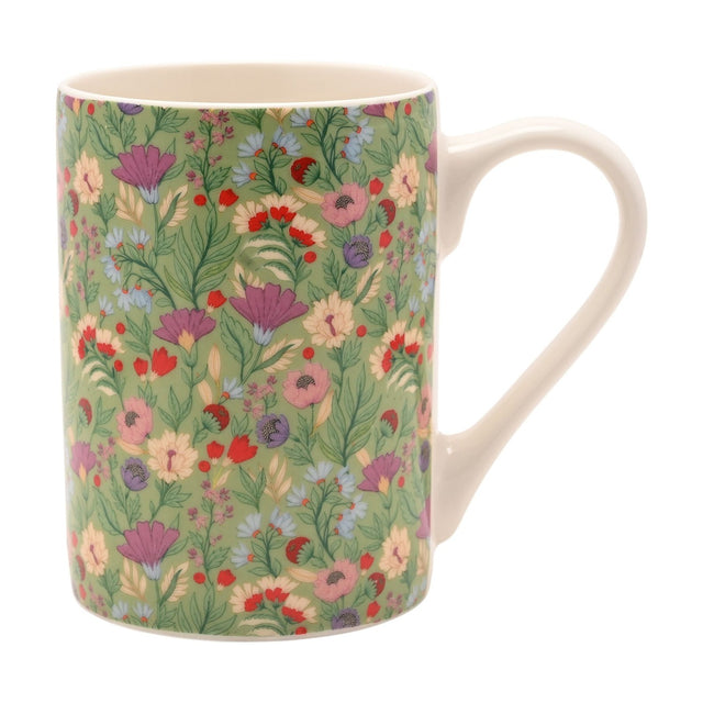 Floral Print Porcelain Mug 10oz with cream handle, rim and interior, green ground covered in pink, purple, red and cream blooms with blue daisies, on a white background.