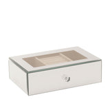 Rectangular mirrored glass jewellery box in silver with glass lid framing a taupe interior featuring a central ring roll and side compartments, shown closed on a plain white background.