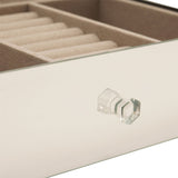 Close-up of the Single Mirror Glass Jewellery Box in silver, showing the taupe-lined ring roll and a faceted glass knob on the mirrored drawer front.