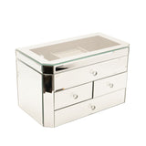 Rectangular mirror glass jewellery box in silver with four drawers, faceted knobs, angled corners and a lift-up lid showing a lined compartment, on a plain white background.