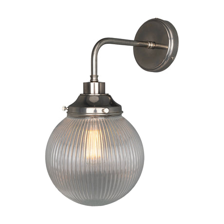 Stanley Ribbed Glass Globe Wall Light IP44, 20cm, with a brushed silver arm and round wall plate holding a ribbed glass globe shade, shown lit on a plain white background.