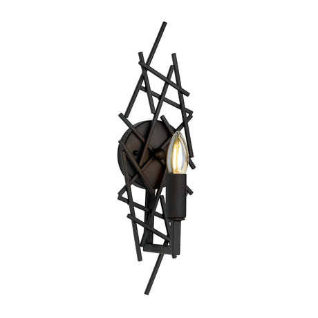 The Taiko 1 Light Wall Light - Olde Bronze is a contemporary sconce with an Olde Bronze finish, showcasing a black geometric design of intersecting metal rods and a single exposed bulb, blending functionality with artistic expression.