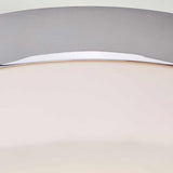 Close-up of the Tamar 1 Light Large Flush lamp, featuring a modern design with a semi-circular polished chrome frame and an opal glass cover. The sleek and minimalistic style provides soft lighting diffused through the material.