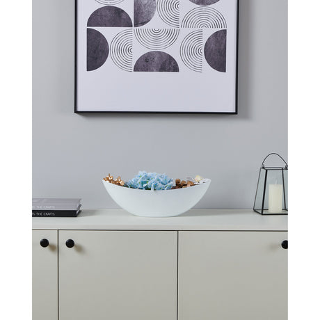 Tazeyol Planter 13cm in white, a long oval boat-shaped dish with a matt white exterior, shown on a sideboard filled with faux hydrangeas beneath a framed geometric print.