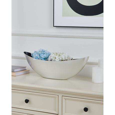 Tazeyol Planter 17.5cm in brushed silver with black interior, boat-shaped with curved rims, holding faux hydrangeas on a cream sideboard.