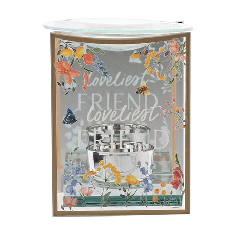 Rectangular glass oil and wax melt burner with mirrored "loveliest FRIEND" script, floral and butterfly design, gold-toned edge and silver tealight holder, on a white background.