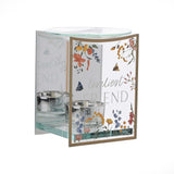 Glass oil and wax melt burner with mirrored front panel reading "loveliest FRIEND", gold-toned edge and floral, bee and butterfly print, dual tealight holders, on a plain white background.