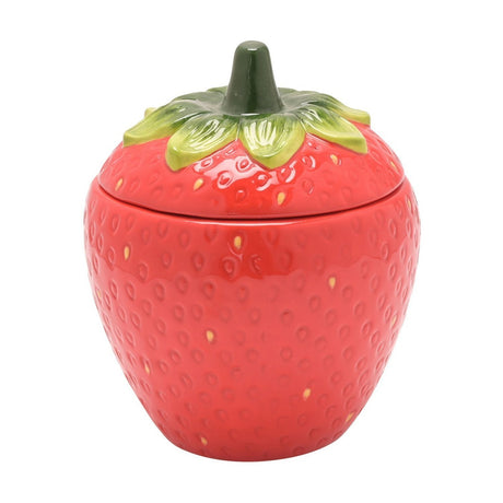 Strawberry-shaped ceramic sugar bowl with lid, 290ml, in glazed red with seed-textured body, green leafy sepals, and stalk-shaped handle, shown on a plain white background.