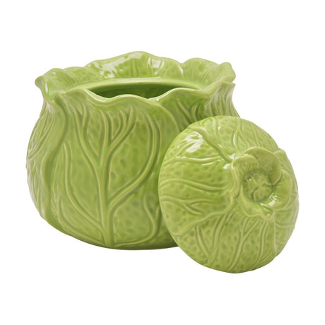 Round green ceramic storage jar moulded as a cabbage, with wavy overlapping leaves and veined texture, shown with its domed lid resting beside it on a white background.