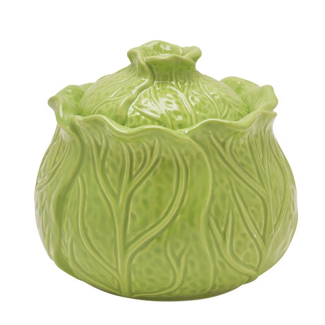 Green glazed stoneware storage jar shaped like a cabbage, with veined, overlapping leaf details and a domed lid topped by a stalk knob, set against a plain white background.