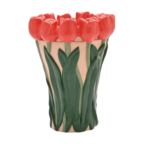 Ceramic vase with a sculpted red tulip rim and raised green leaves over a pale peach-cream ground, shown on a plain white background.