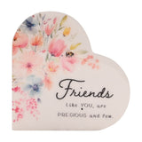White wooden heart-shaped freestanding plaque with pink, peach, blue and yellow floral design, a small bee, and "Friends Like YOU, are PRECIOUS and few" text, on a plain background.