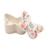 White butterfly-shaped glass trinket box with lift-off lid, floral watercolour print and "Sisters ALWAYS friends FOREVER" script, shown open on a plain white background.