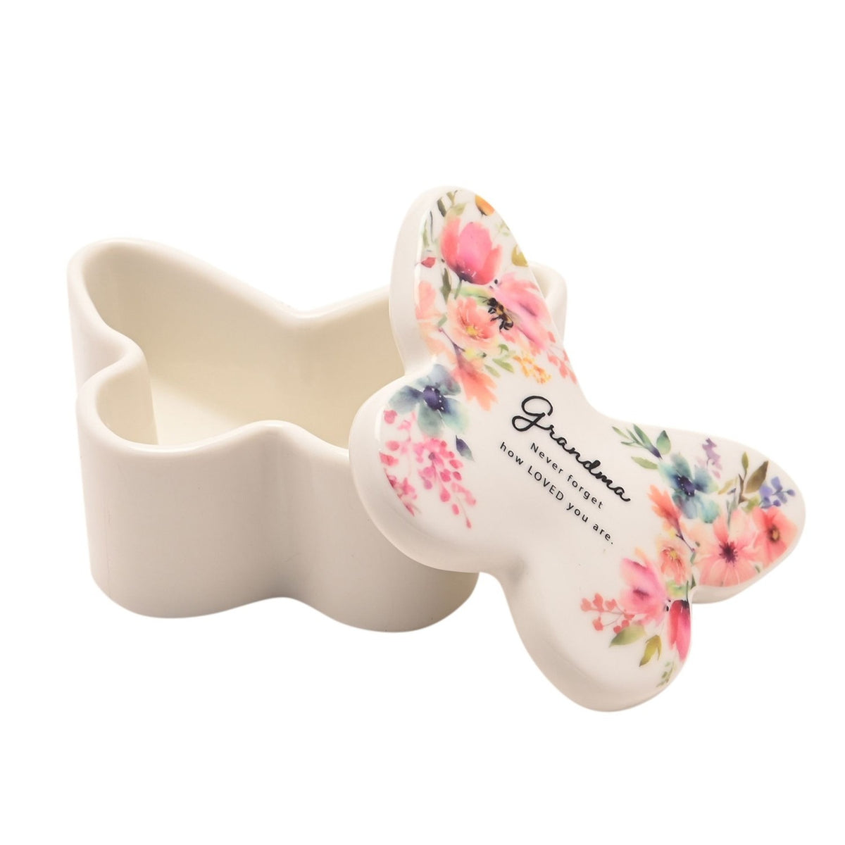 White butterfly-shaped glass trinket box with lift-off floral lid, "Grandma, Never forget how LOVED you are" text, shown open on plain white background.