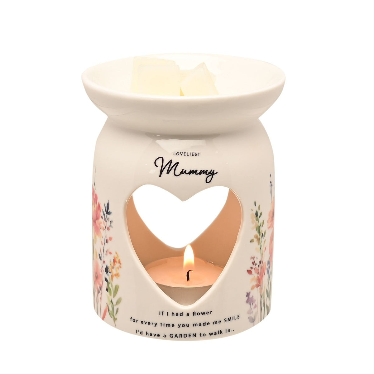White ceramic wax melt burner with heart cut-out, lit tealight inside, wildflower print, "Loveliest Mummy" text and verse, wax cubes in top bowl, on a plain white background.