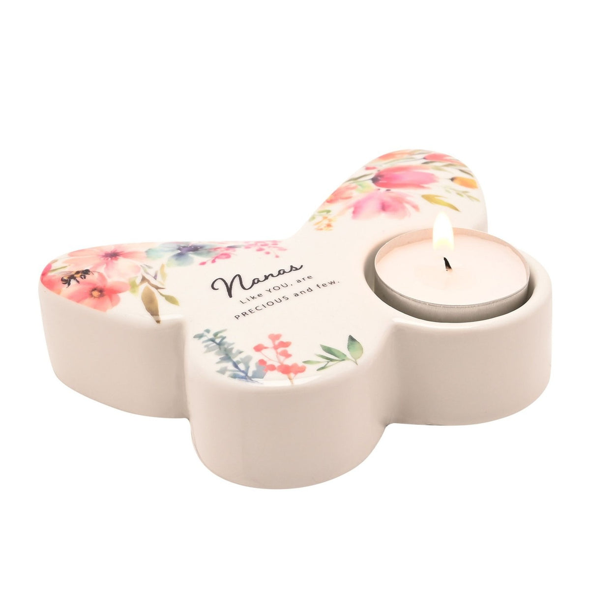 White glass butterfly-shaped tealight candle holder with pink, coral and blue floral design, a lit tealight in one wing, and "Nanas, Like YOU, are PRECIOUS and few" text at centre.