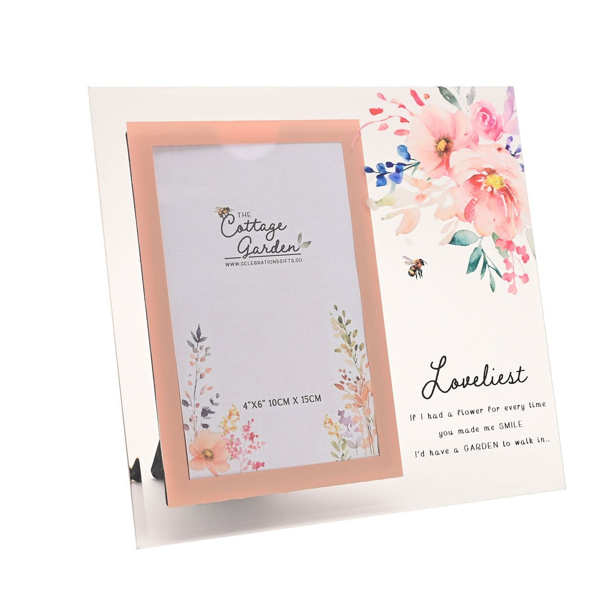 Freestanding glass photo frame with a peach-pink bordered portrait opening, pink floral and bee watercolour design, and "Loveliest" script text on a plain white background.