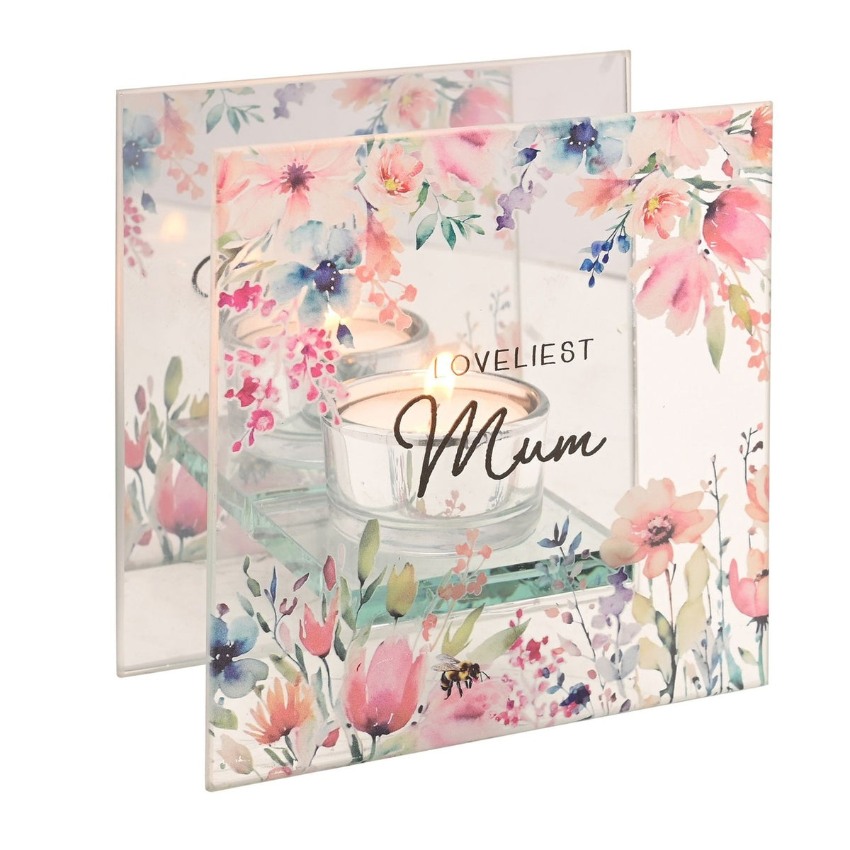 Square glass tealight candle holder printed with pink and blue watercolour flowers and a bumblebee, reading "Loveliest Mum," with a mirrored back panel and glowing tealights, on a white background.
