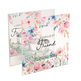 Square glass tealight candle holder with "LOVELIEST Friend" script, watercolour floral and bee design, clear glass cup on a narrow ledge, shown on a white background.