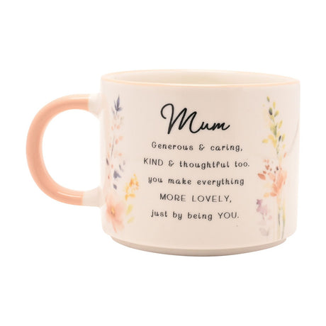 White stoneware mug for Mum with peach handle, printed verse in black script, and watercolour wildflower sprigs on either side, set on a plain white background.