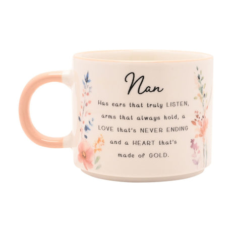 White stoneware mug with peach handle, printed with "Nan" verse in black script and watercolour wildflowers in peach, blue and lilac on a plain background.