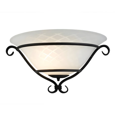 The Torchiere 1 Light Wall Uplighter - Black with Etched Opal Glass showcases an etched opal glass shade and black metal frame, adorned with decorative curved accents and geometric patterns on the glass. It emits a warm glow that highlights its intricately designed elements with a hint of Gothic elegance.