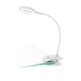 Telarne Clamp Lamp 42cm in white plastic with a flexible gooseneck and ring-shaped LED head, clipped onto a glass desk edge against a plain background.