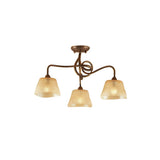 Mantra Tentacle 3 light semi-flush ceiling light with rustic gold curved arms and frosted amber glass shades on a white background.
