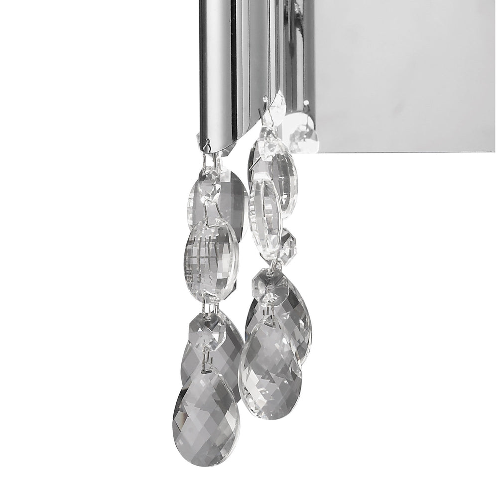 Close-up of Tiffany wall light showing polished chrome arm with cascading faceted crystal droplets against a plain white background.
