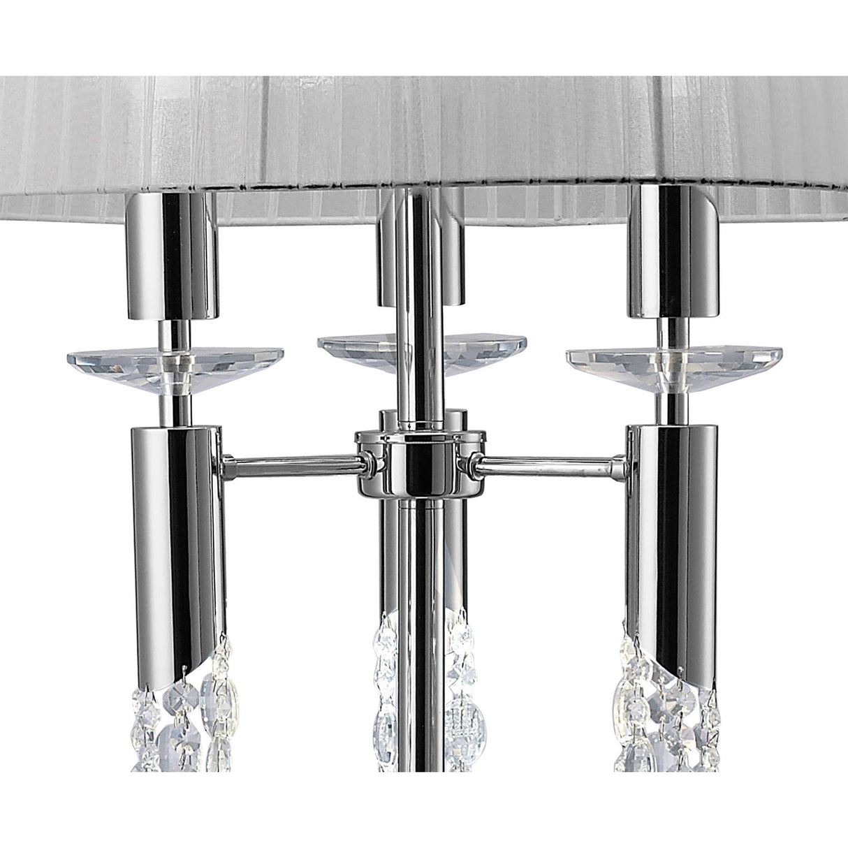 Close-up of the Tiffany 6 Light Crystal Floor Lamp, featuring polished chrome arms, clear crystal accents, and a translucent white fabric shade. The elegant design includes hanging crystal strands for a stylish, modern look.