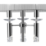 Close-up of the Tiffany 6 Light Crystal Floor Lamp, featuring polished chrome arms, clear crystal accents, and a translucent white fabric shade. The elegant design includes hanging crystal strands for a stylish, modern look.