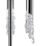 Close-up of the Tiffany 6 Light Crystal Floor Lamp in chrome, featuring two poles and faceted teardrop crystals that reflect light for a sparkling effect against the metallic finish, complemented by a cream shade.