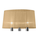 A close-up of the Tiffany 6 Light Crystal Floor Lamp in chrome with a bronze shade showcases its stylish, dimmable lighting and elegant multi-pole design for customizable ambiance against a white background.