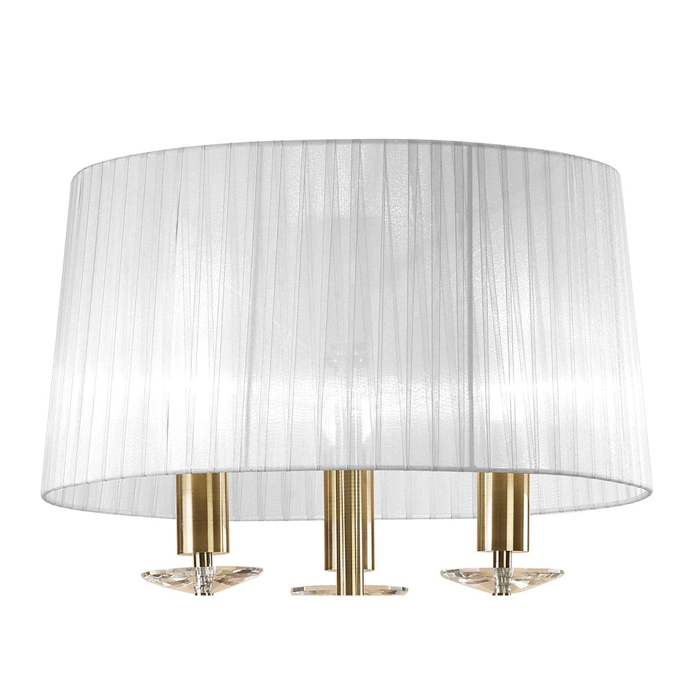 Pair this elegant wall sconce with the Tiffany 3 Light Crystal Floor Lamp, Brass With White Shade for a coordinated, sophisticated look enhanced by crystal accents and gleaming gold finishes.