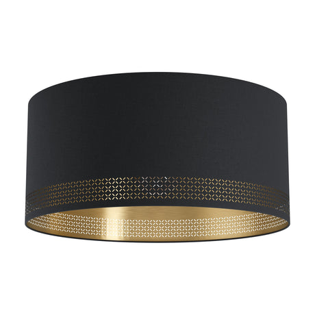 Tonvorne flush ceiling light in black fabric drum shade with brushed gold lining, cross cut-out pattern around the lower edge, and black steel body, shown on a white background.