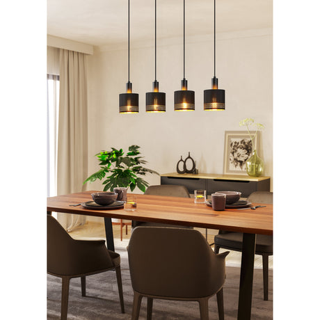 Tonvorne Fabric Linear Pendant Light in black, four drum shades with perforated lower bands and gold-toned interiors, suspended above a wooden dining table.