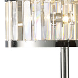Close-up of the Torre 3 Light Crystal Table Lamp in polished chrome, featuring a cylindrical shade with clear vertical glass panels and visible light bulbs inside.