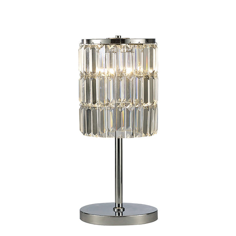 The Torre 3 Light Crystal Curtain Table Lamp features a cylindrical shade of rectangular clear crystals with cascading accents and a polished chrome stand and round base, creating a dazzling, sparkling effect when lit.